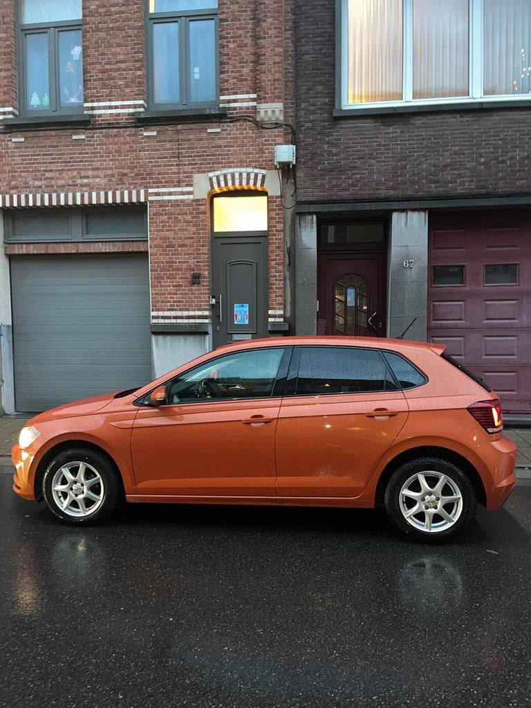 Volkswagen polo oranje benzine 90km